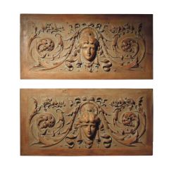 Pair of carved overdoor panels
