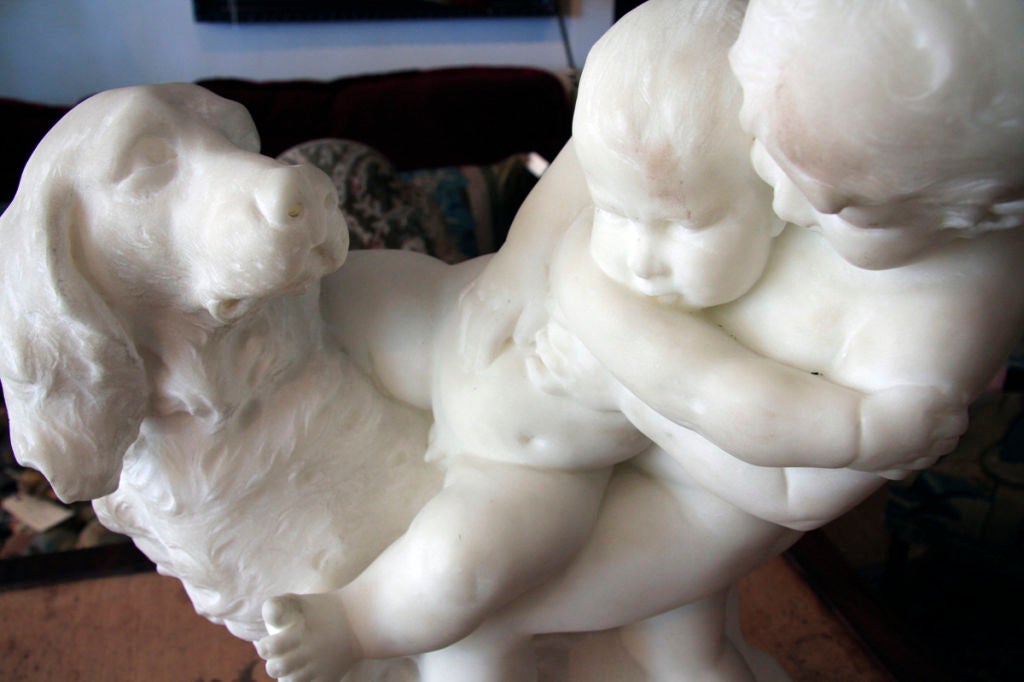 Marble figural group by French sculptor, Benoit Rougelet (1834-1894) depicting children and a dog at play. Formerly of the Marshall Coyne estate.
