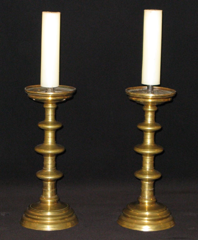 Dutch A pair of bell metal pricket candlesticks