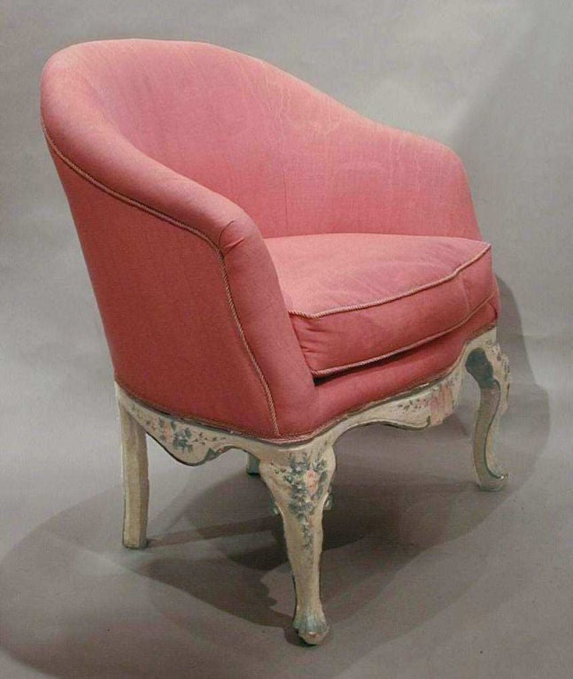 A pair of painted wood tub chairs (poltrone a pozzetto)<br />
Venice, circa 1750-1760<br />
<br />
Literature: S. Levy, Il Mobile Veneziano del Settecento, Milan, 1964, Vol. I, fig. 47.<br />
	<br />
The form and decoration of this pair of tub
