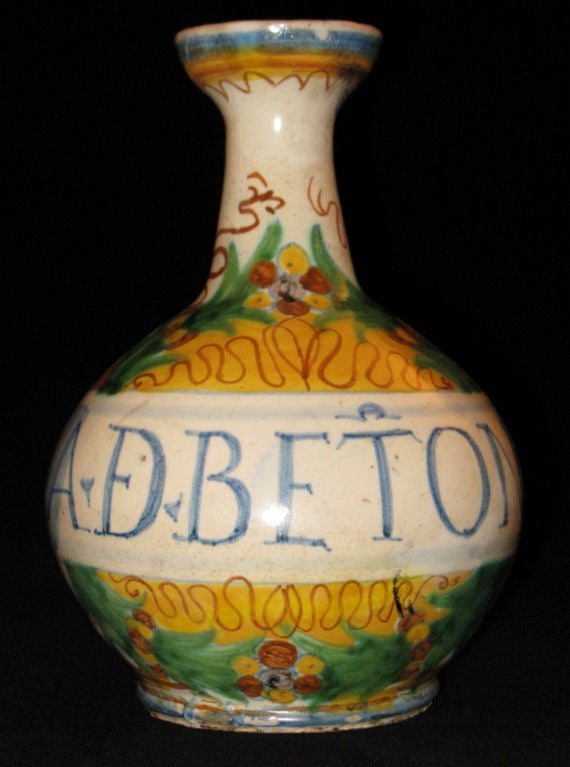 A Polychrome Ceramic Vase With Latin Inscription