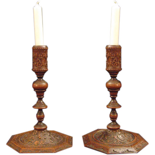 A Pair of Bois de Saint Lucie (Cherry wood) candlesticks For Sale