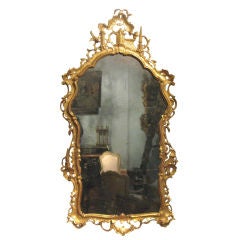A Venetian Gilded Mirror With Chinoiserie Carving