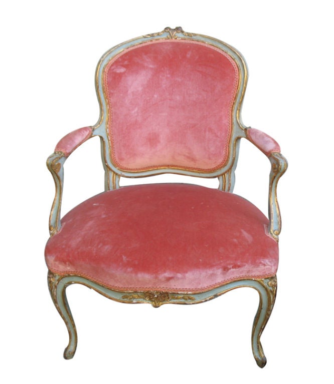 A Pair Of Italian Painted And Parcel Gilded Armchairs
