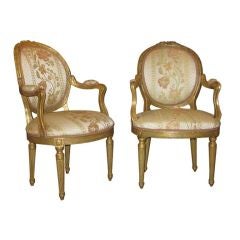 Pair Of Carved Gilt Armchairs