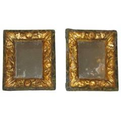 A pair of finely carved and gilded framed mirrors