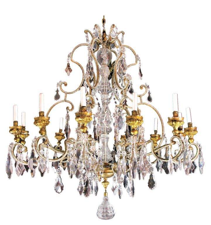 Unusually Brilliant 12 Light Gilt  Metal And Crystal Chandelier For Sale