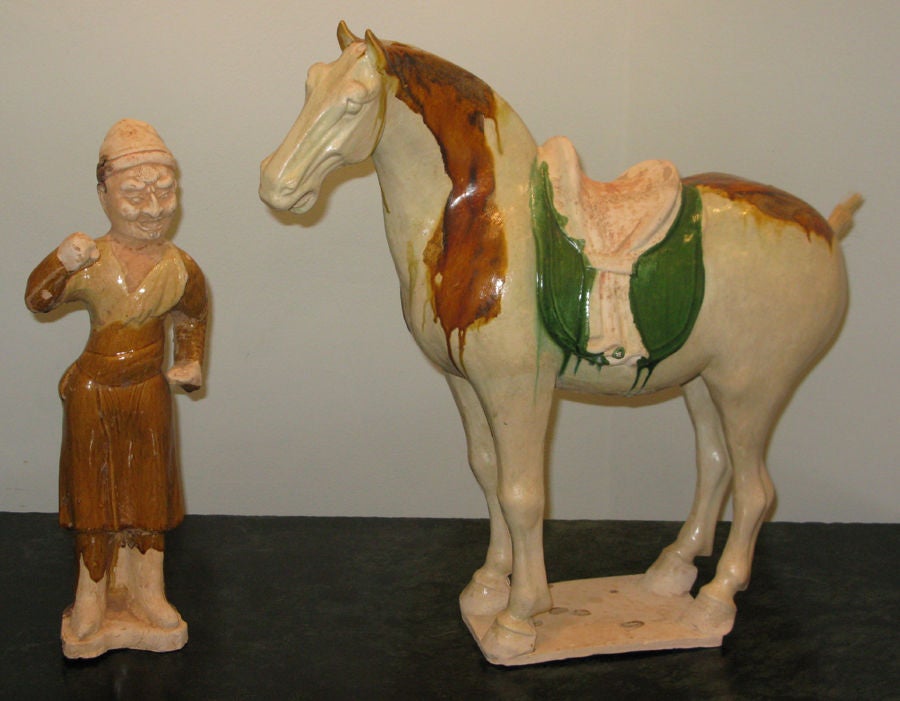 Sancai glazed pottery horse with western attendant<br />
Oxford Thermo Luminescence Analysis Report: C198p60<br />
<br />
<br />
It is highly desirable to have the attendant with the horse. The Tang Empire saw a flowering of creativity in many