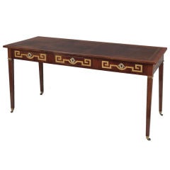 A Neoclassic mahogany desk inlaid with Greek key design