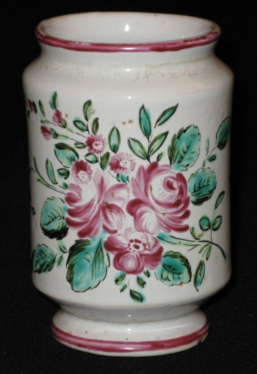 A small glazed earthenware majolica albarello