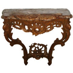 A fine openwork Louis XV carved oak console