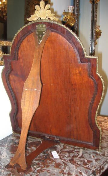 18th Century and Earlier An oak, rosewood, brass table mirror inlaid with tortoiseshell