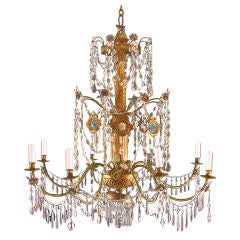 Antique A carved and gilded wood eight light chandelier