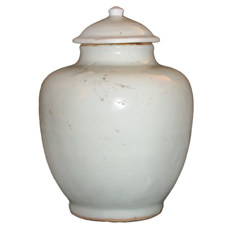 A Chinese white porcelain baluster form vase with lid. For Sale