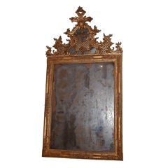 Exceptionally fine barocco carved and gilded-wood mirror