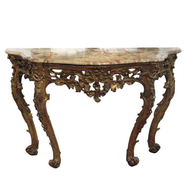 An Italian carved and gilded console with marble top For Sale