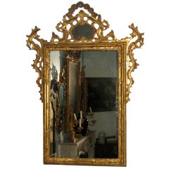 A fine carved and gilded mid-eighteenth century Venetian mirror