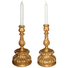 Pair of Carved and Gilded Wood Candlesticks