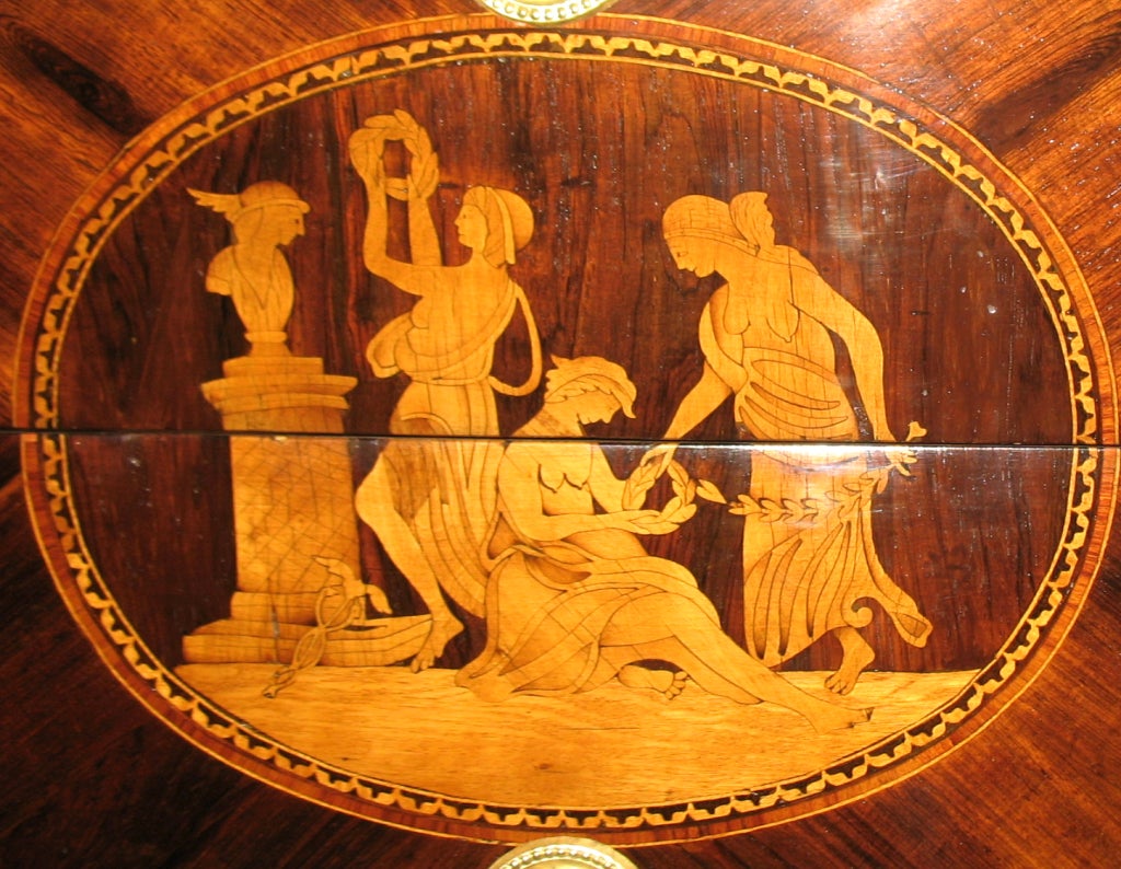 A Palisander, Tulipwood and Marquetry Commode