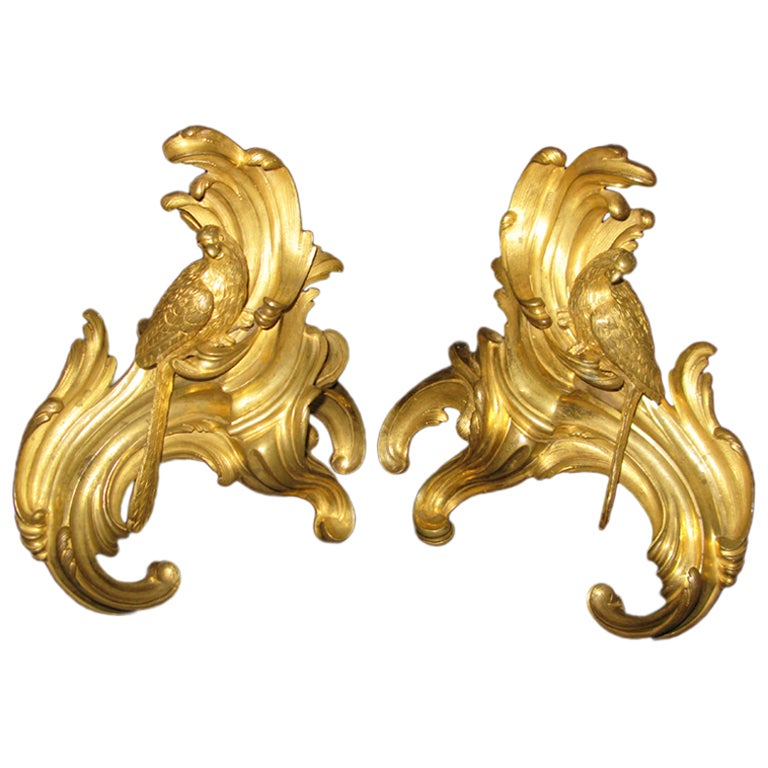 A Louis XV pair of very finely gilded and chased bronze chenets For Sale