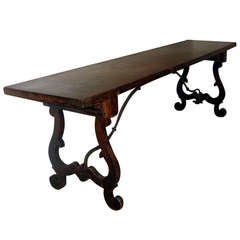 A Walnut Refectory Table With Lyre Form Leg Supports