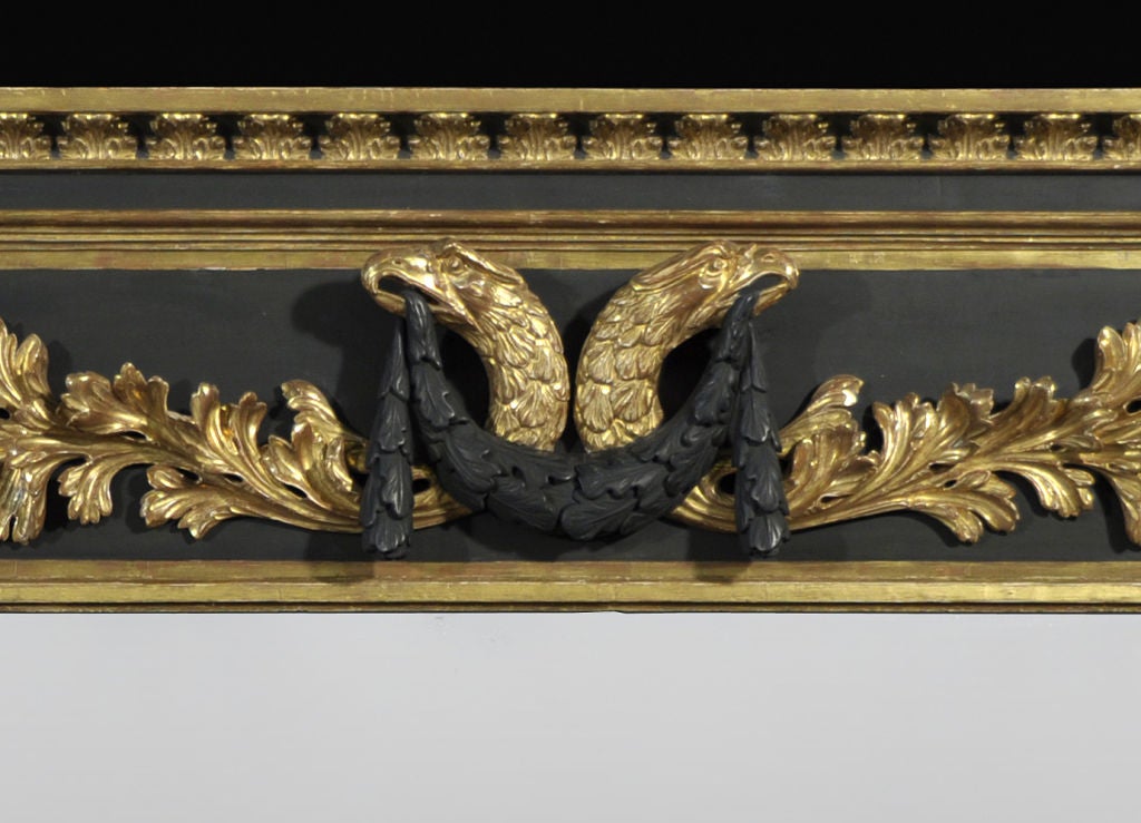 Regency Gilt and Ebonized Overmantel Mirror of Breakfront Form In Excellent Condition For Sale In New York, NY