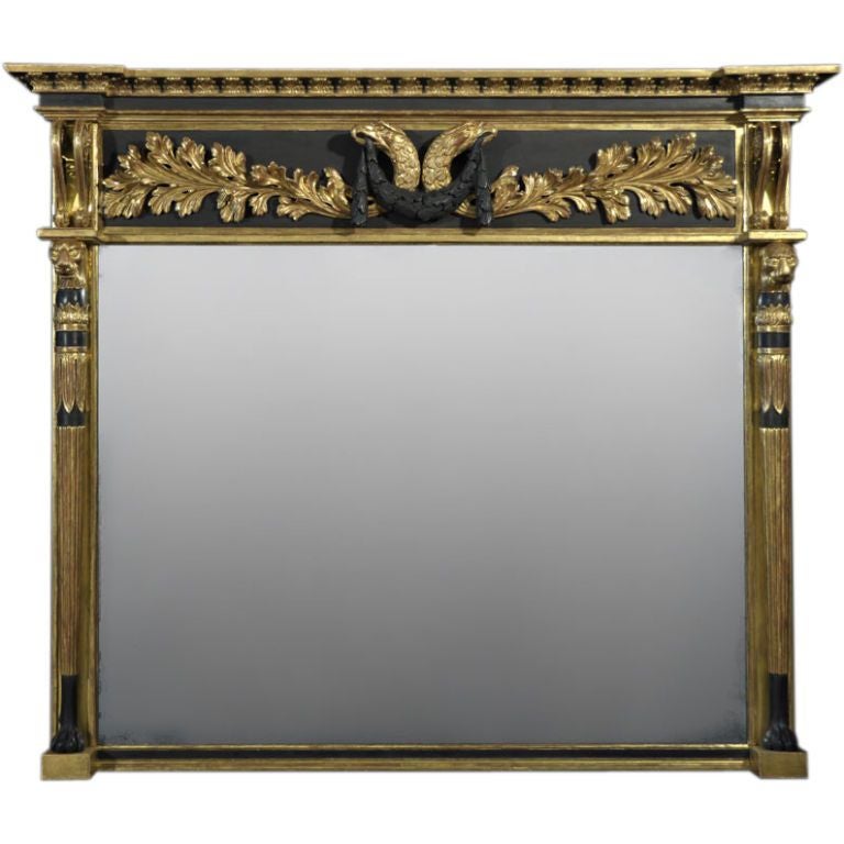Regency Gilt and Ebonized Overmantel Mirror of Breakfront Form For Sale