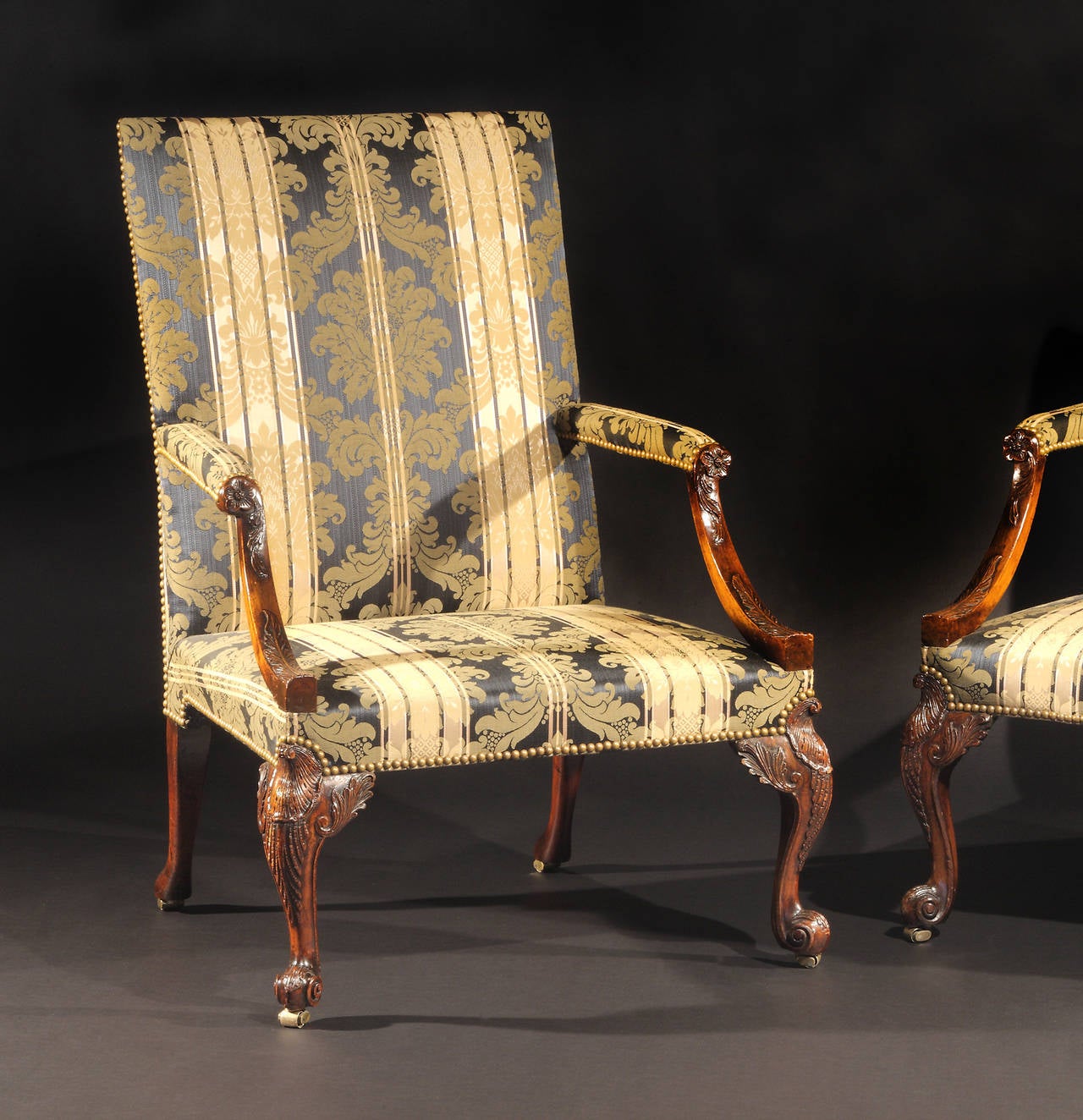 English Superb Pair of George III Mahogany Carved Library Armchairs For Sale