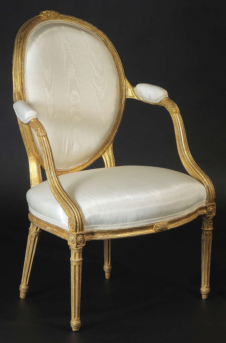 English Fine Pair of George III Giltwood Oval Backed Armchairs For Sale