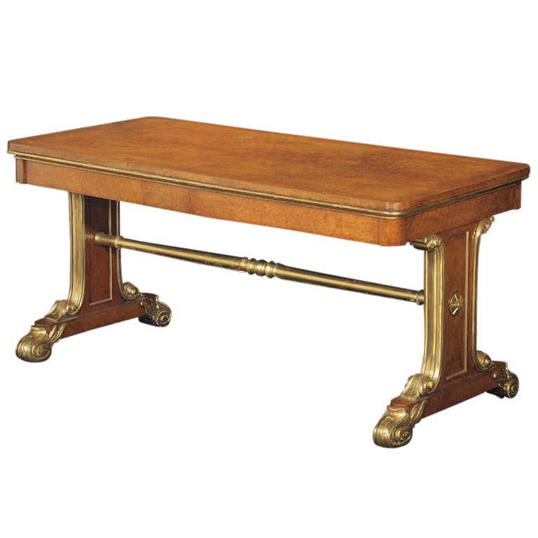 A Superb George IV Amboyna Two Drawer Parcel Gilt Library Table