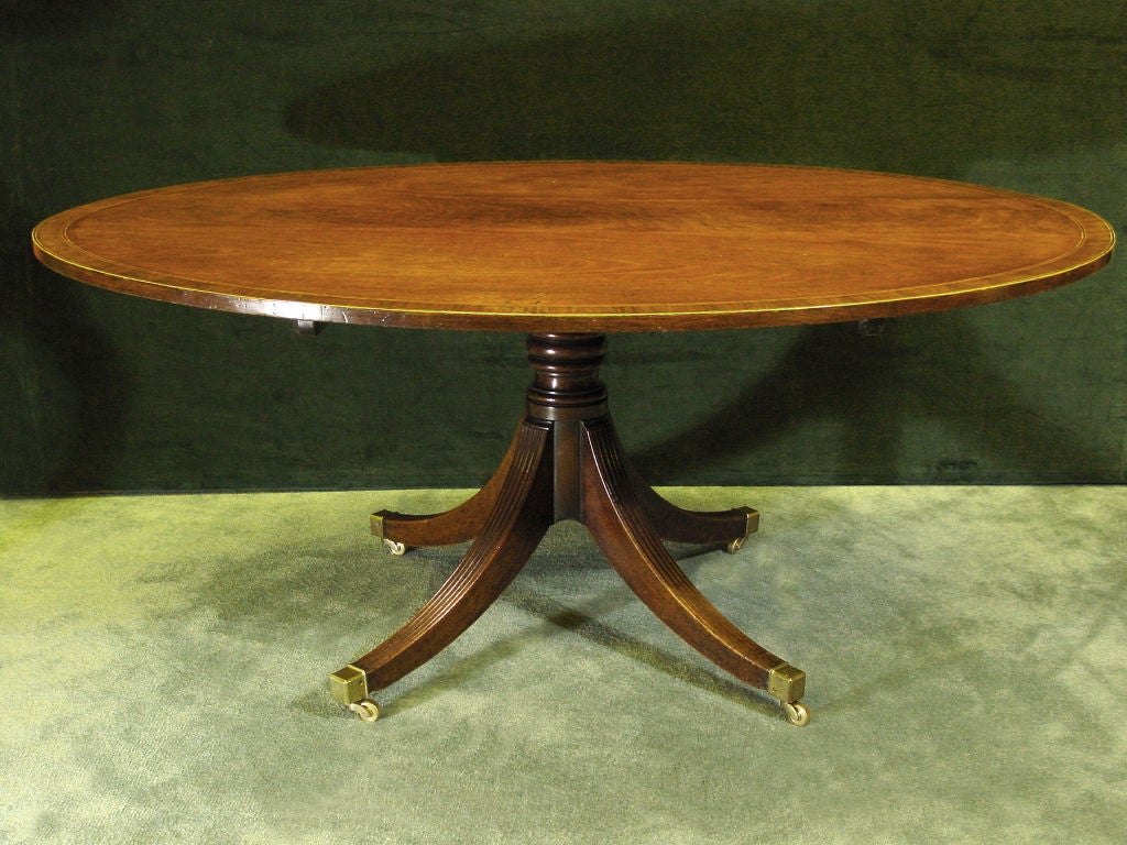 A Fine Late George III Mahogany Oval Breakfast Table