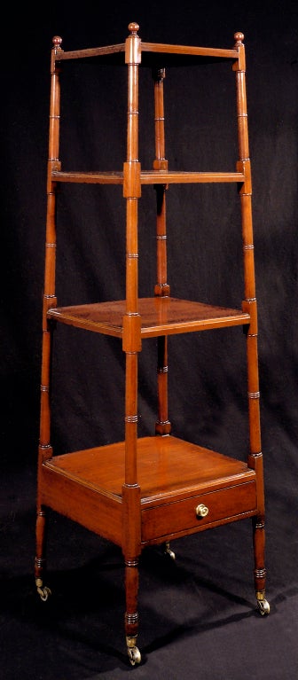 A Regency Mahogany Etagere Of Pyramid Form