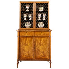 A Fine George Iii Harewood And Marquetry Cabinet