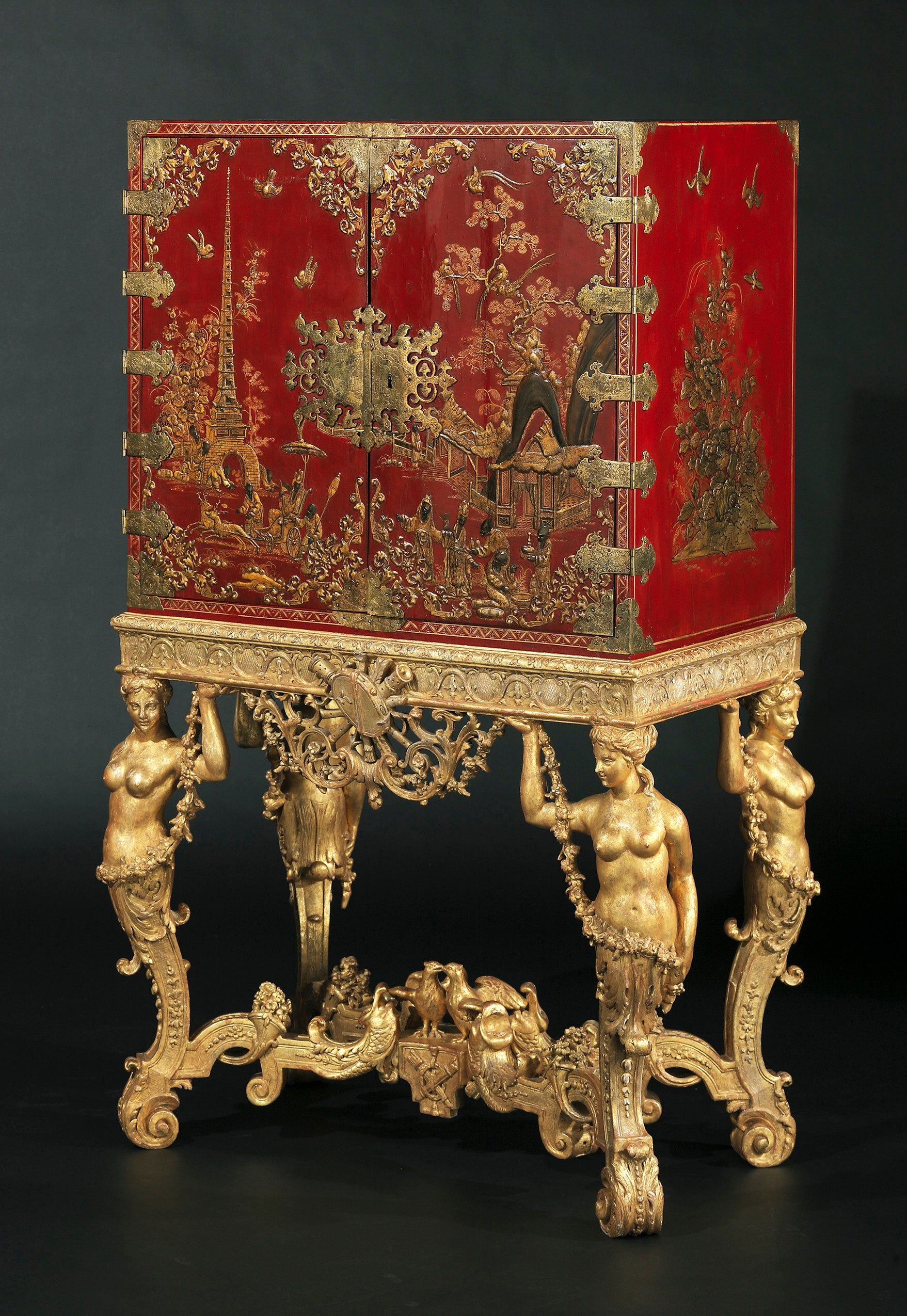 A William III Parcel-Gilt Scarlet-Japanned Brass-Mounted Cabinet On a Stand
