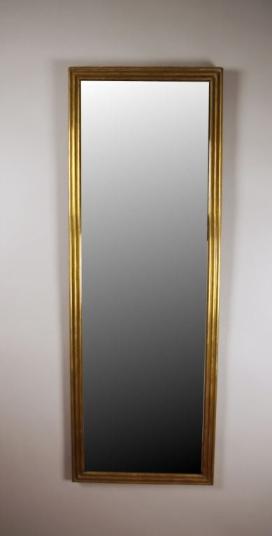 Louis Philippe brass mirror, with molded frame and replaced beveled glass.