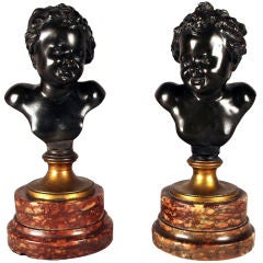 Pair of Bronze Busts on Marble Bases, After Clodion