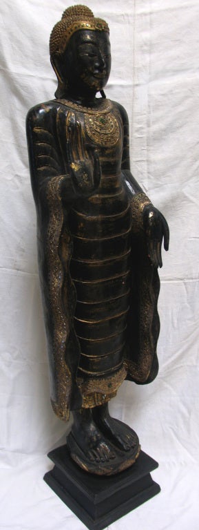 Old Ebonized Gilt Figure of Buddha