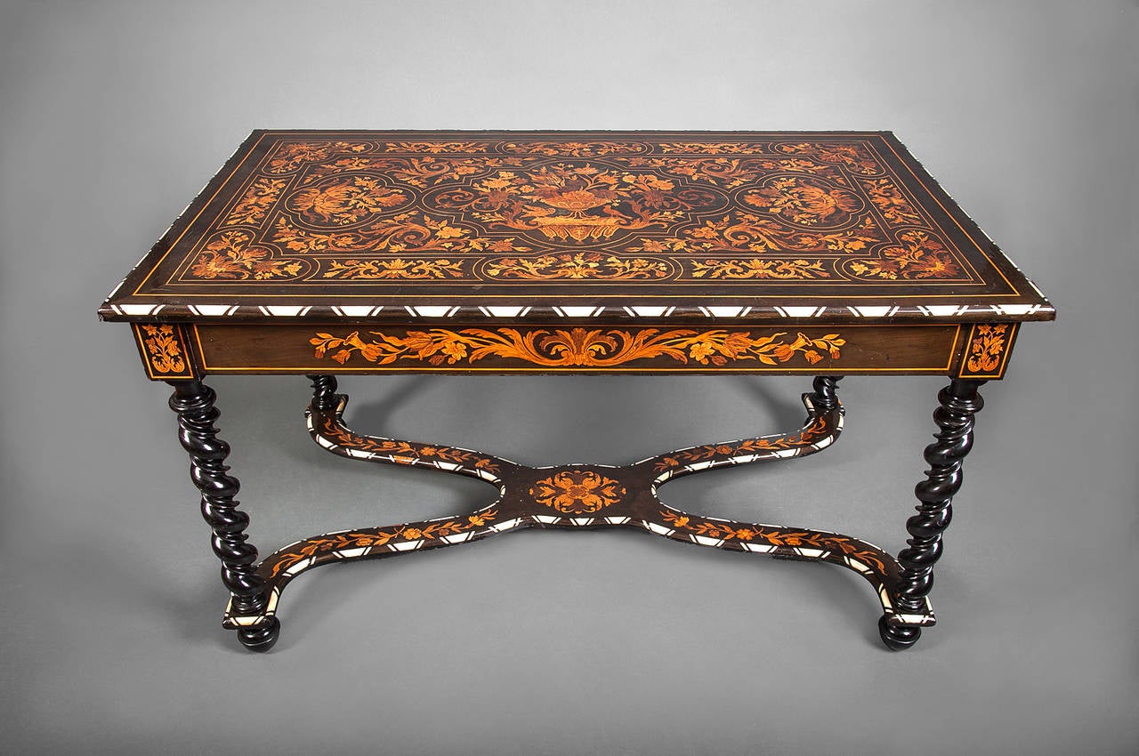 Early 19th Century Dutch Marquetry Writing Table with Inlay.  Stunning example of marquetry craftsmanship with turned legs and inlay on the stretchers.  Desk has a single drawer.