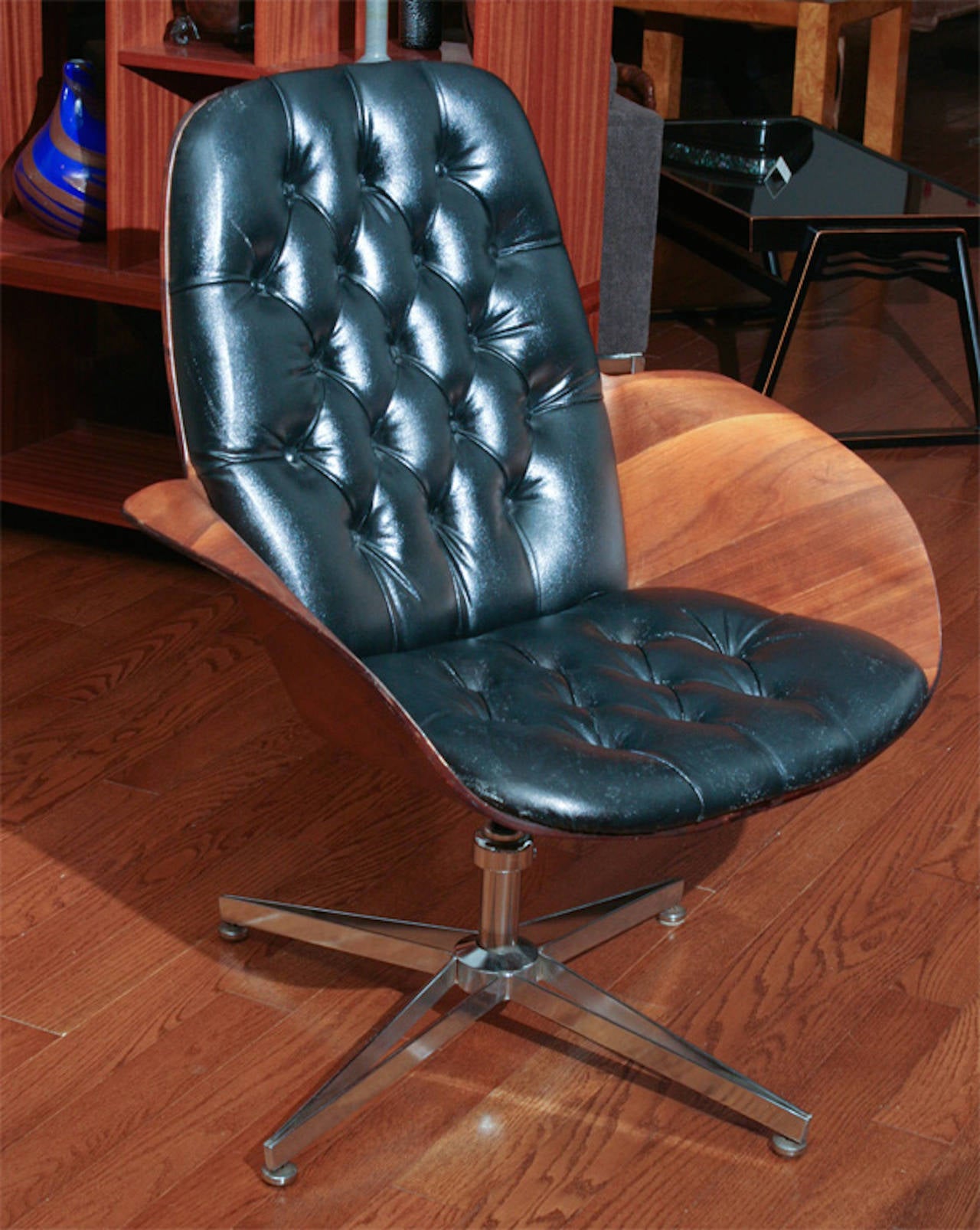 Chair by George Mulhauser for Plycraft.  Wood and faux black leather.