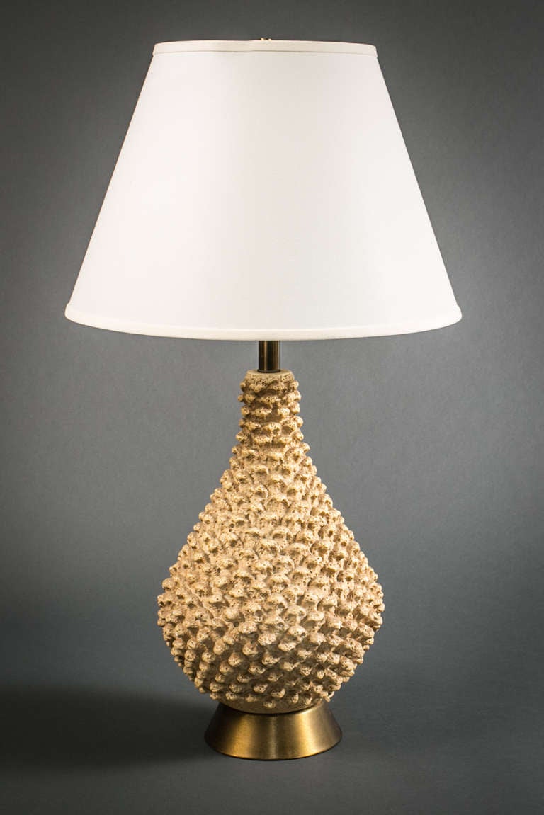 Single pineapple shaped lamp
Ceramic with brass base.