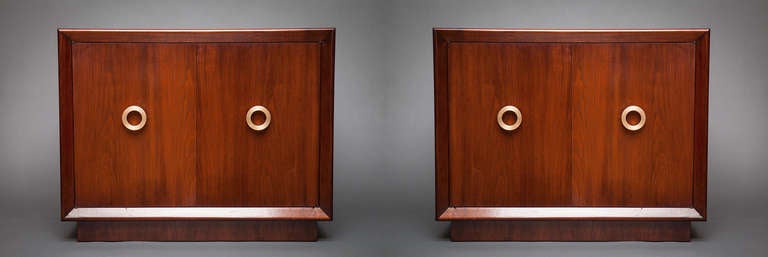 Pair of American Art modern cabinets with brass pulls.