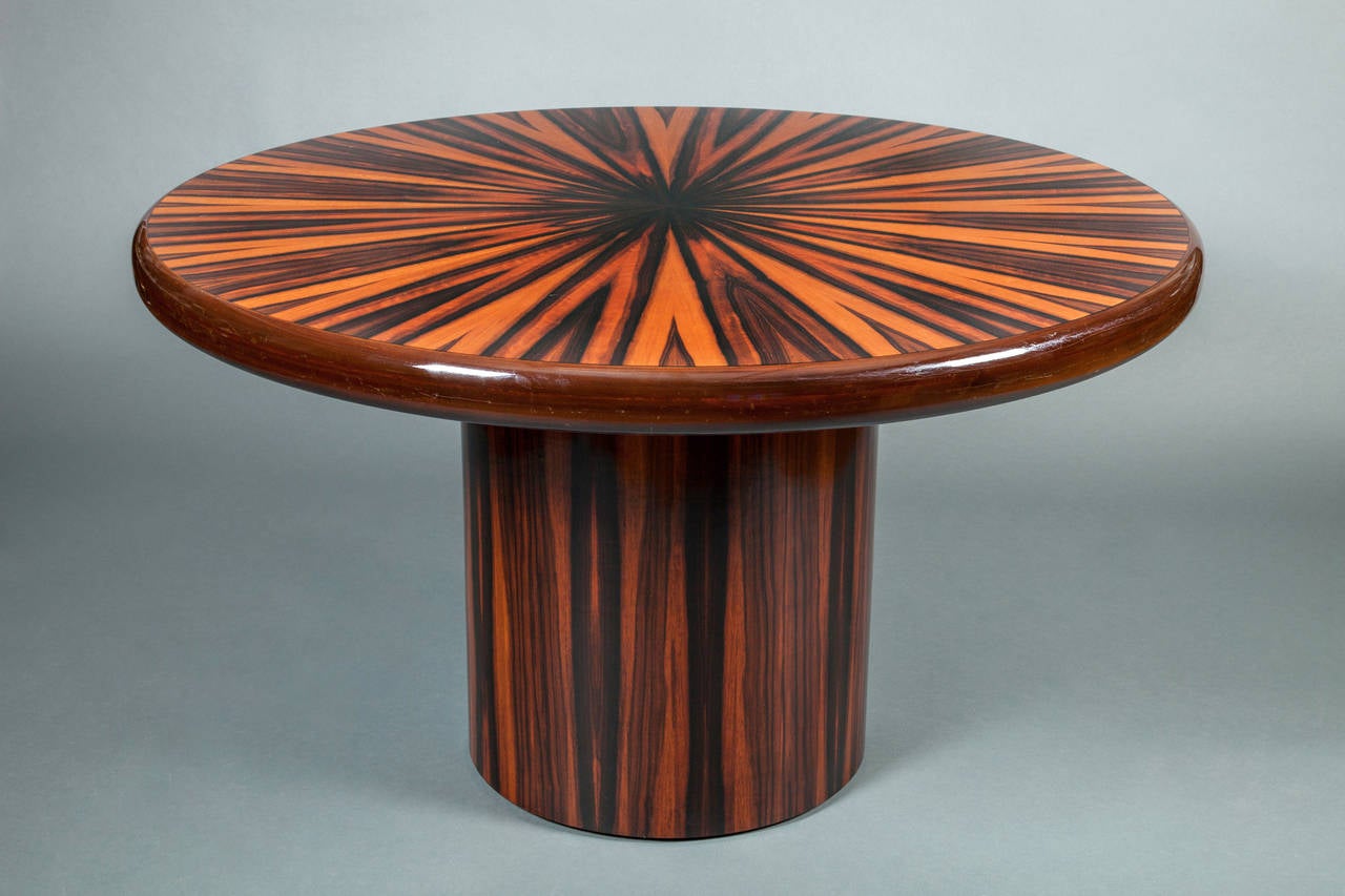 Italian zebrawood round center table
with striking wood pattern (zebrawood is a type of rosewood).