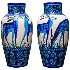 Vasi in ceramica con cervo di Charles Catteau