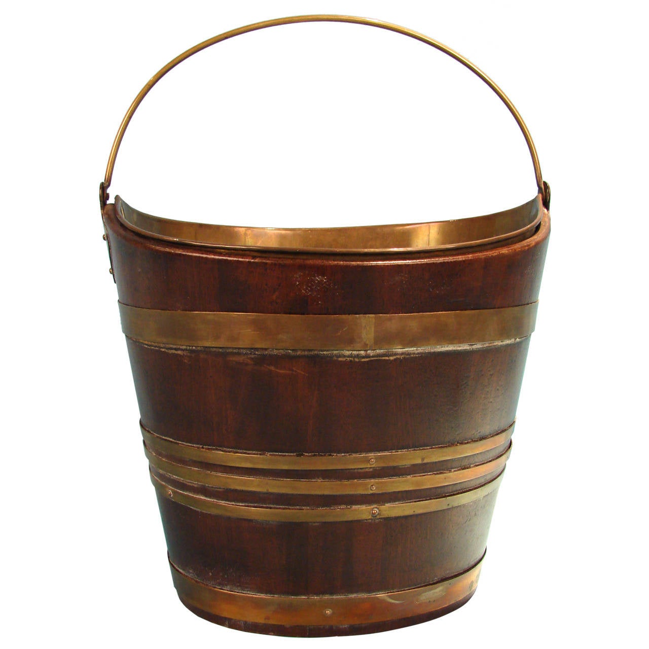 A late Georgian mahogany navette form brass bound peat bucket with a brass liner, circa 1800.