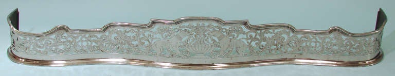 Georgian Polished Steel Pierced and Engraved Fire Fender with Dogs