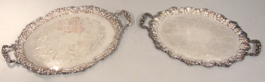 Two graduated silver plated tea trays, the larger signed Free & Sons, England, 