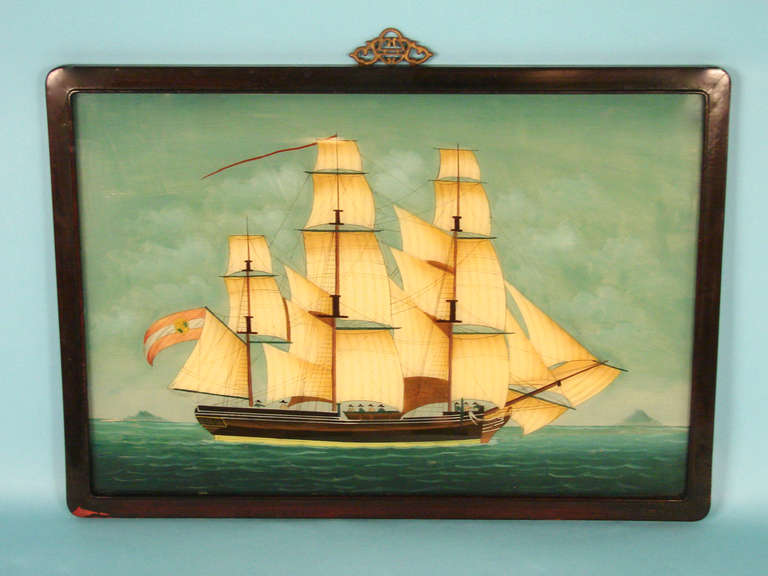 A well-executed Chinese reverse painting on glass of a fully rigged sailing ship in an appropriate rosewood frame.
