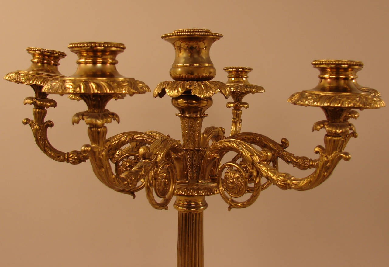 A fine quality neoclassical style cast brass five-light candelabrum of large-scale, probably French, circa 1860.