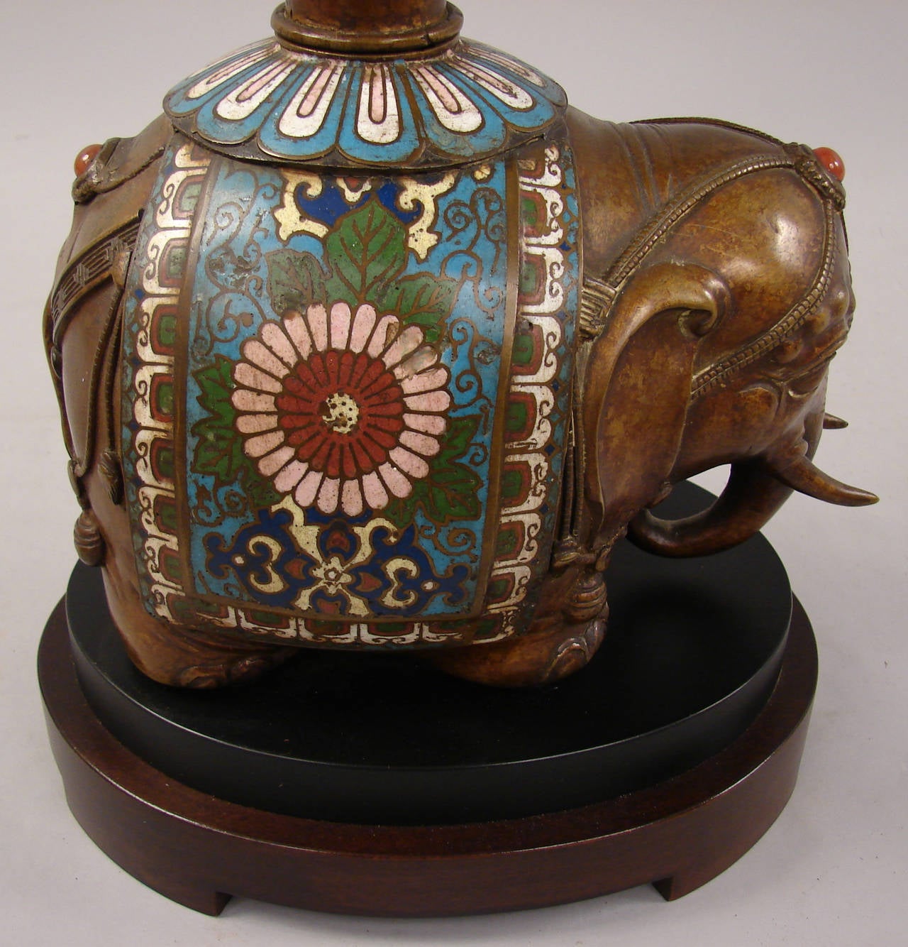 A stout Chinese champleve and bronze elephant now mounted as a lamp. Circa 1900 0r earlier.