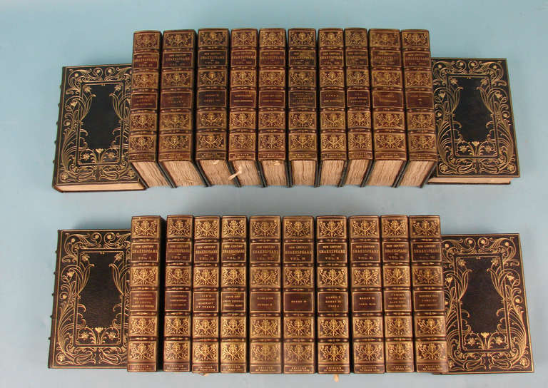 The works of Shakespeare in 24 volumes, The Edition Deluxe of the New Century Plays of William Shakespeare limited to 500 copies, this number 232,  leather bound in full navy blue morocco, covers and spine gilt with floral motif, top edge gilt,